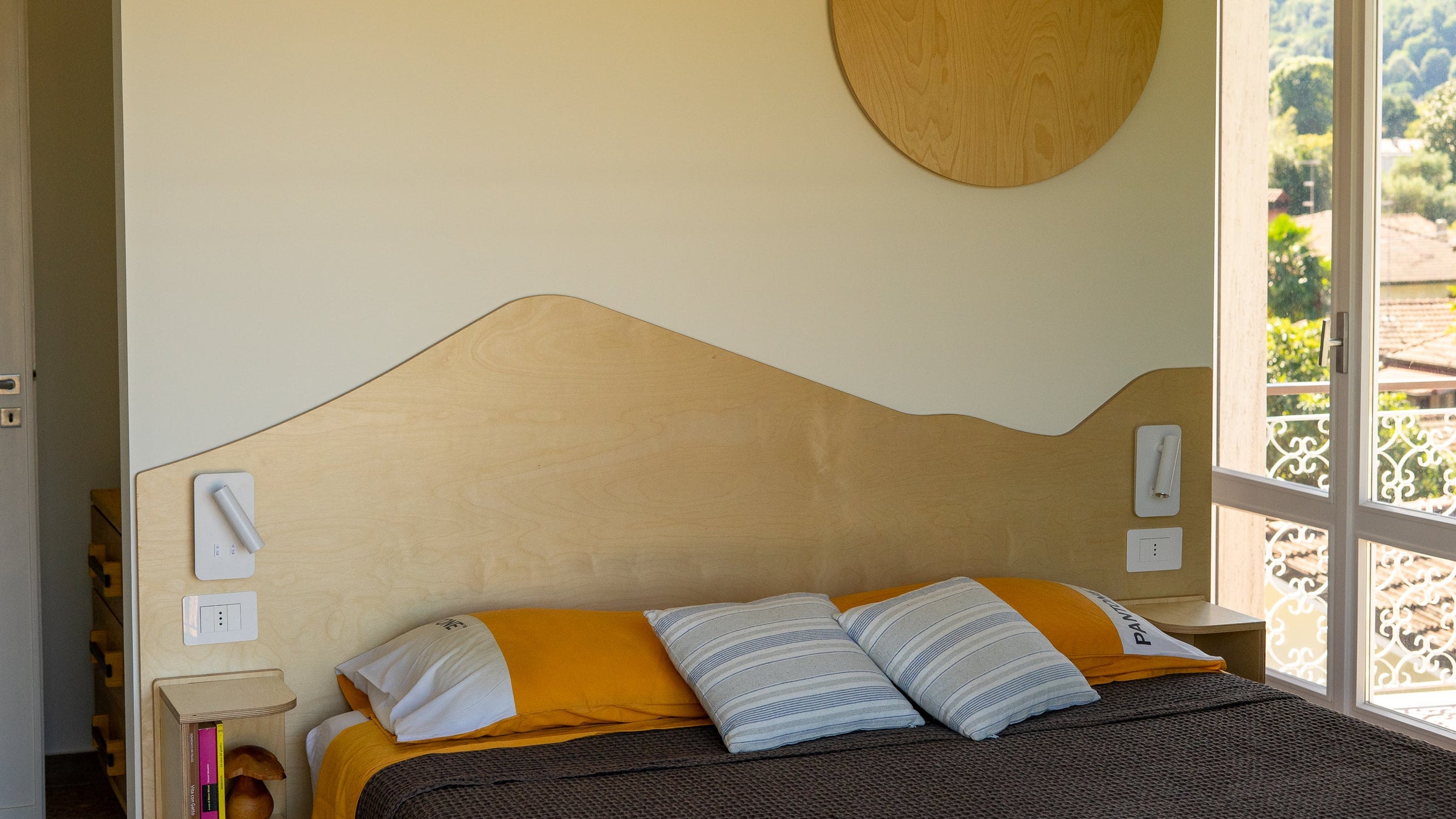 Mountain headrest with bedside tables